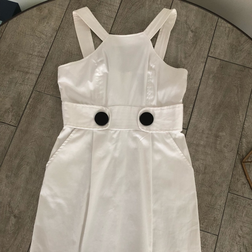 White dress with pockets and cinched waist